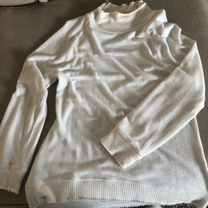 Deconstructed edge cream Z Supply sweater.